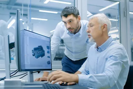 IT engineers designing on their computers
